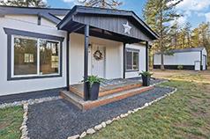 LOON LAKE HOME ON 5+ ACRES