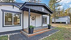 LOON LAKE HOME ON 5+ ACRES