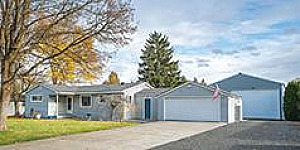 CHARMING HOME WITH 30'x40' SHOP WITH TALL RV DOOR