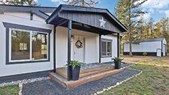 LOON LAKE HOME ON 5+ ACRES