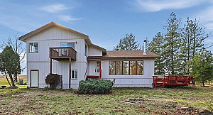 CLOSE BY COUNTRY LIVING ON 20 ACRES!