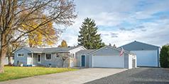 CHARMING HOME WITH 30'x40' SHOP WITH TALL RV DOOR