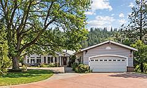 SITTING ABOVE THE TRANQUIL BANKS OF LATAH CREEK