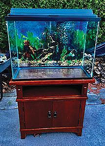 38 GALLON FISH TANK WITH SOLID WOOD STAND, $200