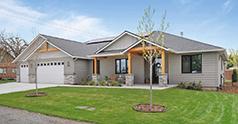 ENJOY MAIN FLOOR LIVING IN THIS CUSTOM BUILT LUXURY