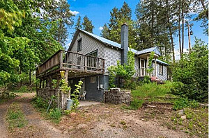 1.82 ACRES & CREEK WITH A GREAT HOME