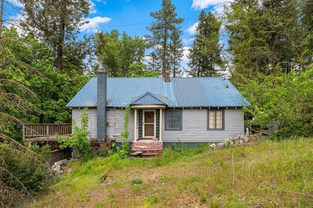 1.81 ACRES & CREEK WITH A GREAT HOME