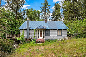 1.81 ACRES & CREEK WITH A GREAT HOME