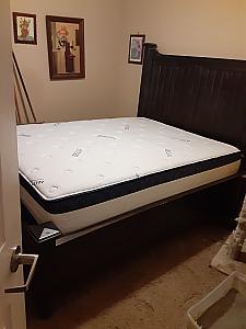 DARK WOOD FRAME KING SIZED BED 