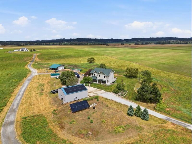 ELEVATED COUNTRY LIVING ON 12+ ACRES