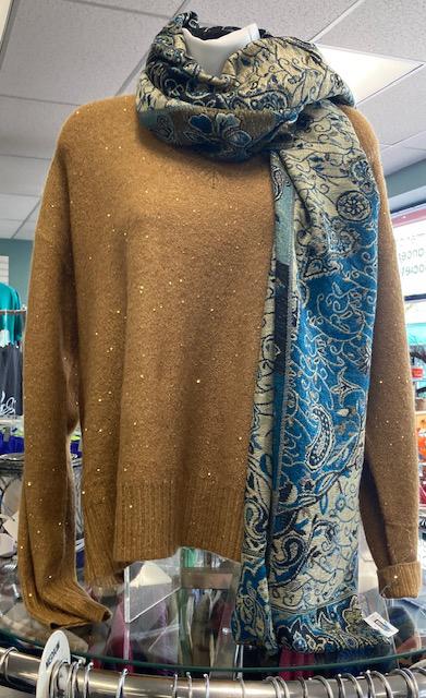 DISCOVERY SHOP HAS A GREAT SELECTION OF SWEATERS FOR FALL