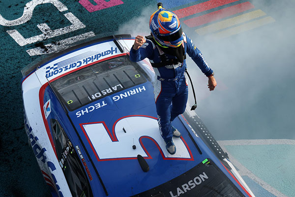Kyle Larson, driver of the #5 HendrickCars.com Chevrolet, celebrates after winning the NASCAR Cup Series Straight Talk Wireless 400 at Homestead-Miami Speedway