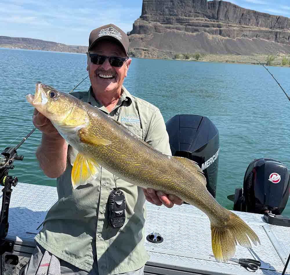 Whitney Graybill fishing at Banks Lake during a Father’s Day trip, targeting walleye and smallmouth bass along the Million Dollar Mile